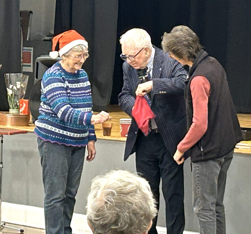 John Richard with 2 Margarets  helping with his magic.
